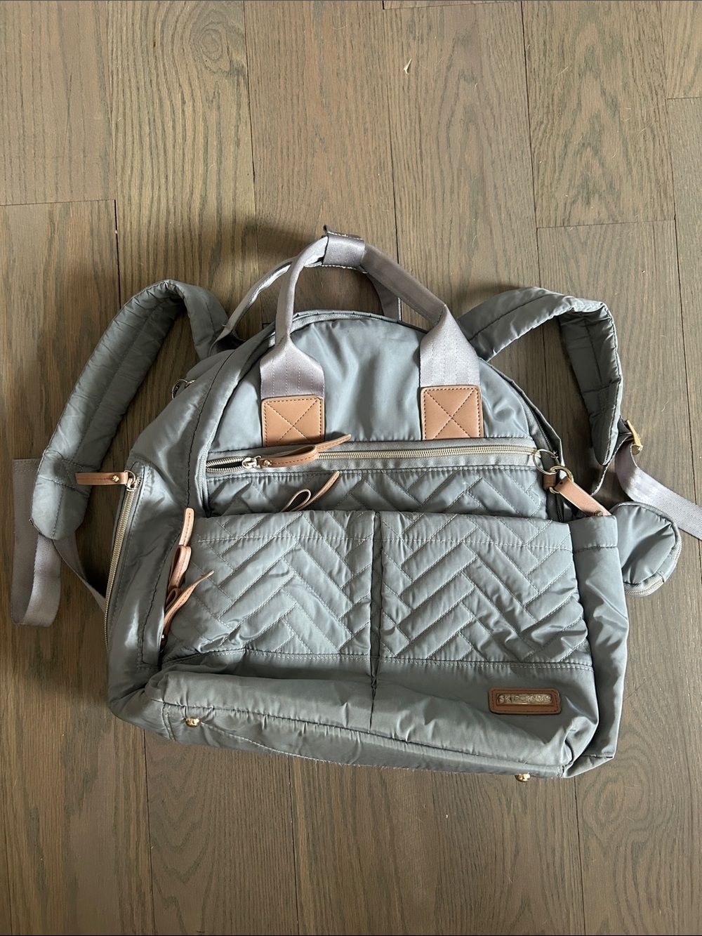 Skip Hop Light Gray Quilted Diaper Bag with bottle and diaper changing bag